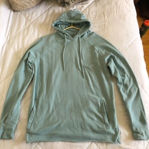 Long sized hoodie. The fabric curls up at the rim apart of style.